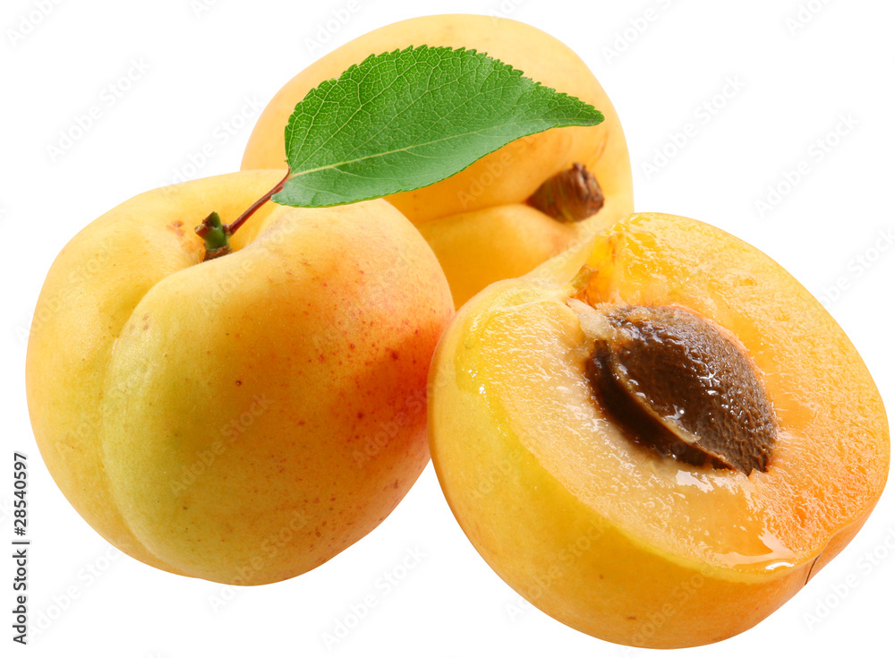 Three apricot with leaves isolated on white background. Three apricot with leaves isolated on white background.
