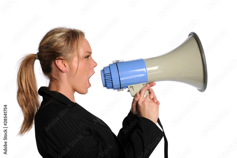 Young businesswoman screaming with a megaphone