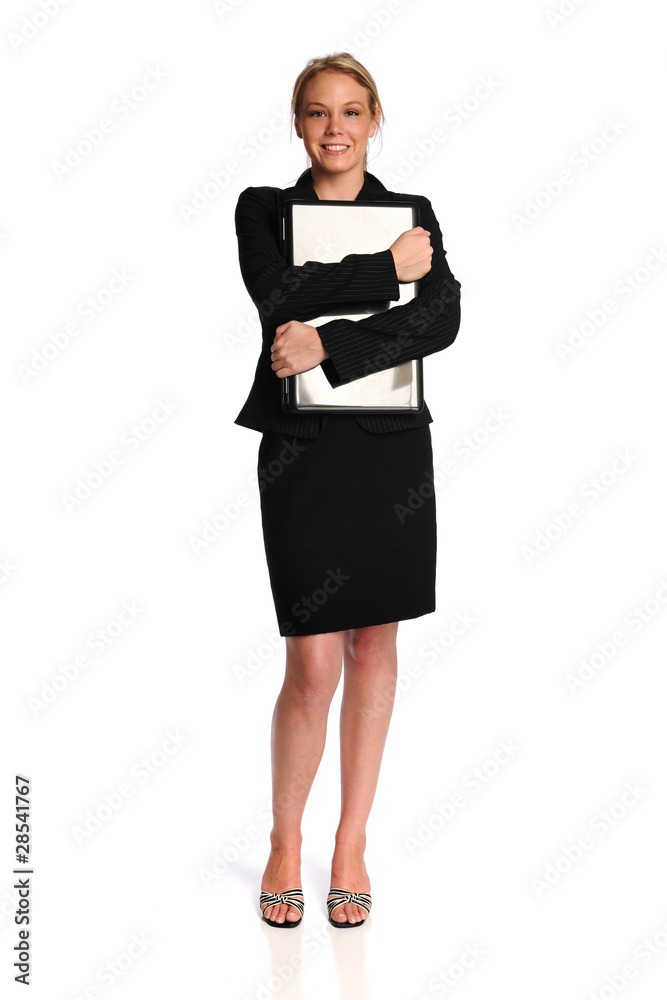 Young businesswoman holding a laptop Young businesswoman holding a laptop