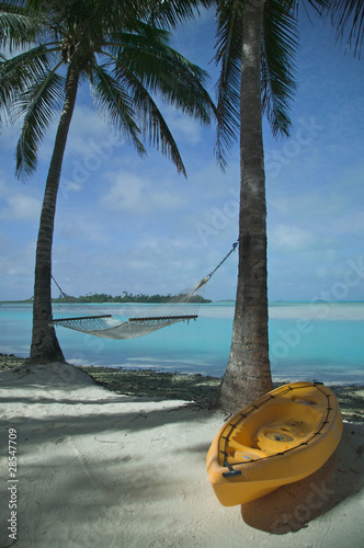 Kayak and Hammock on a Tropical Beach