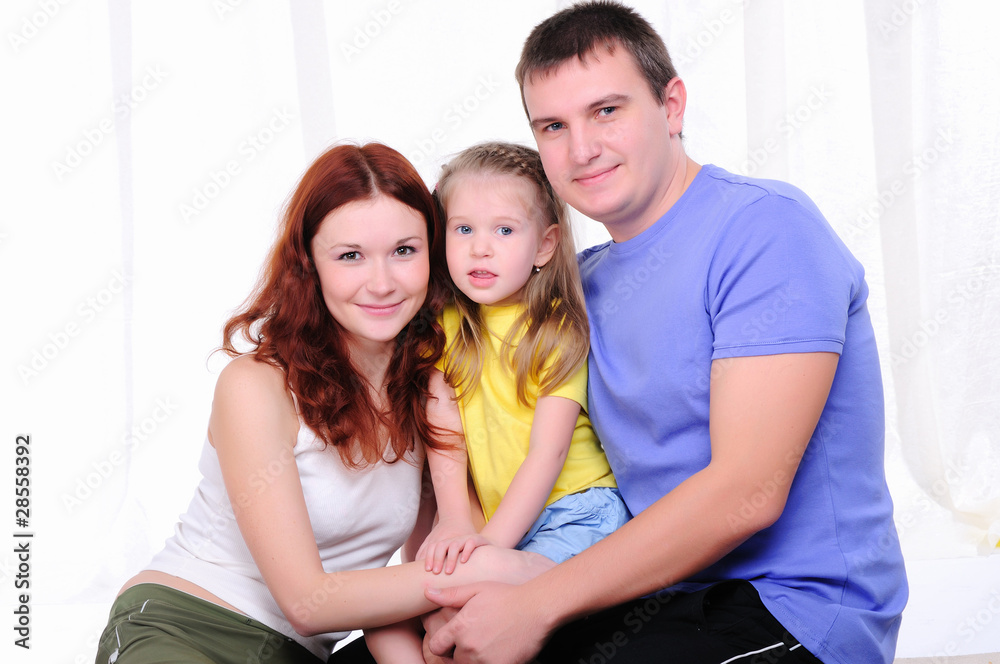 mother, a young father and young daughter mother, a young father and young daughter