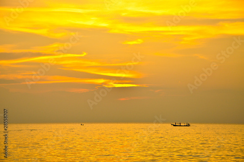 sunset over sea © Adulsak