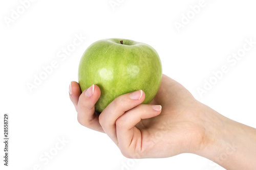 green apple on hand isolated