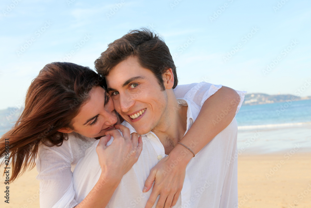 Portrait of lovely couple at the beach in summer Portrait of lovely couple at the beach in summer