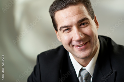 Portrait of attractive businessman in blacksuit © Al Troin