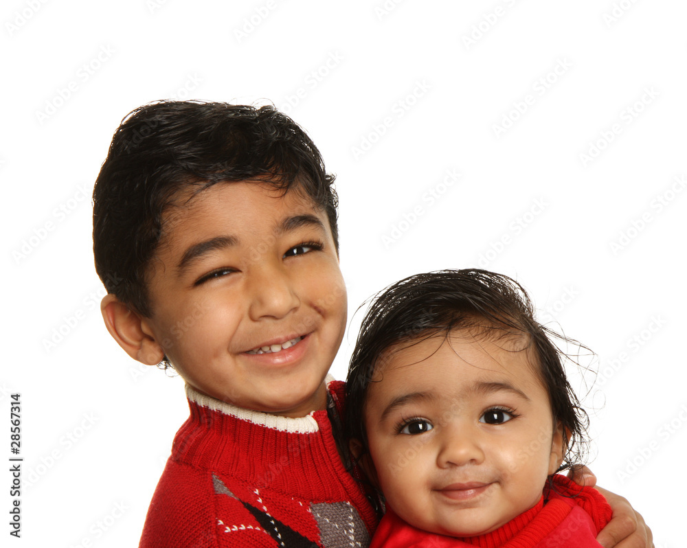 Smiling Siblings - Older Brother Holding Baby Sister Smiling Siblings - Older Brother Holding Baby Sister