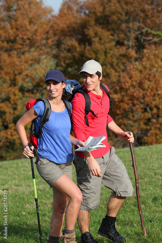 Young couple hiking in countryside