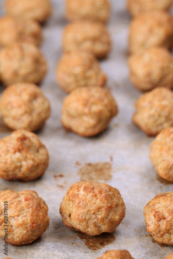 Roast meatballs on baking sheet. Shallow DOF Roast meatballs on baking sheet. Shallow DOF