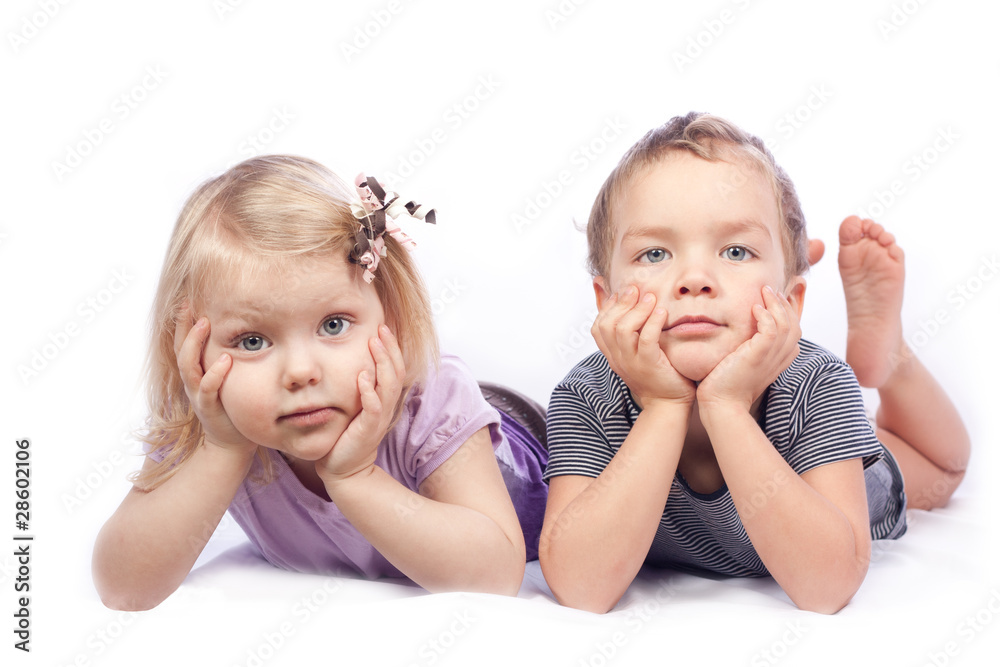 Child lying on white Child lying on white