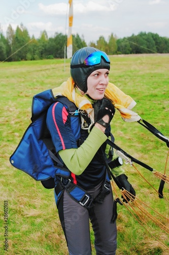 The smiling girl-parachutist