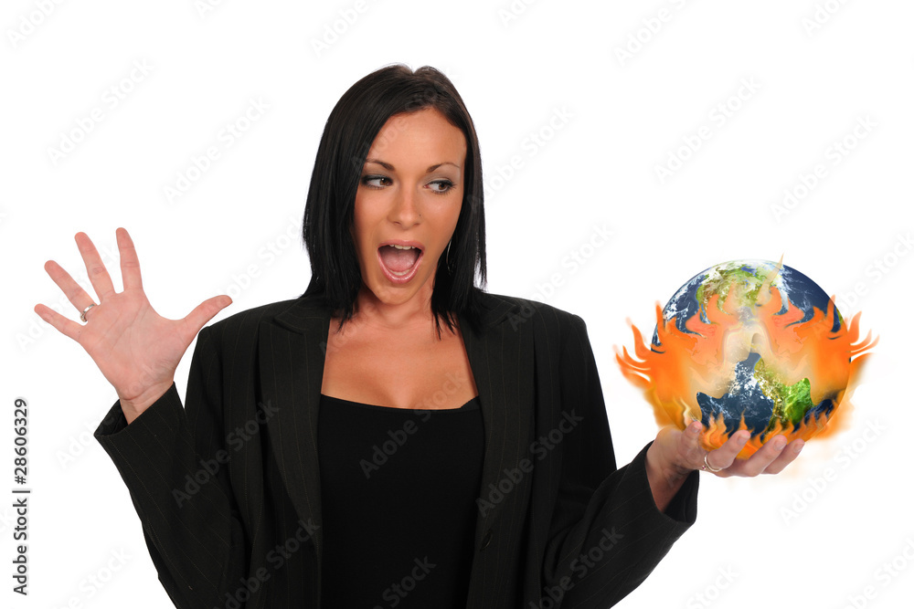 Businesswoman holding the earth on fire Businesswoman holding the earth on fire