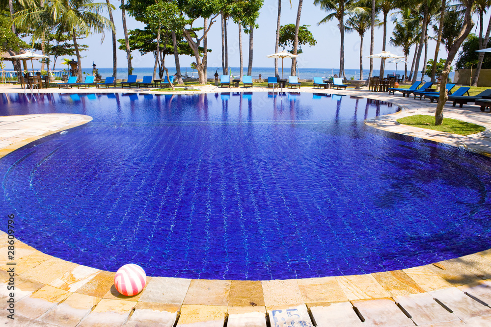 Pool, ocean, palm trees .Indonesia. Bali..