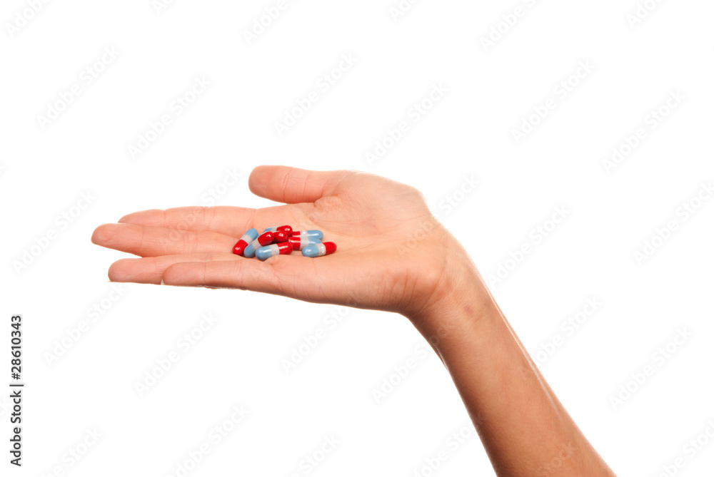Capsule pills in doctor's palm Capsule pills in doctor's palm