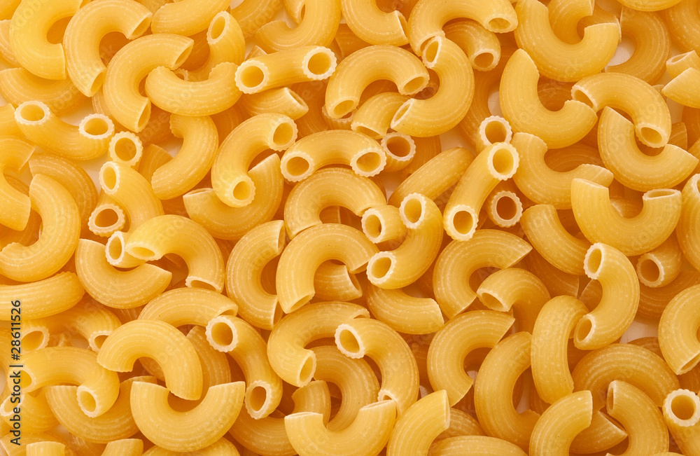 Raw macaroni background Raw macaroni background