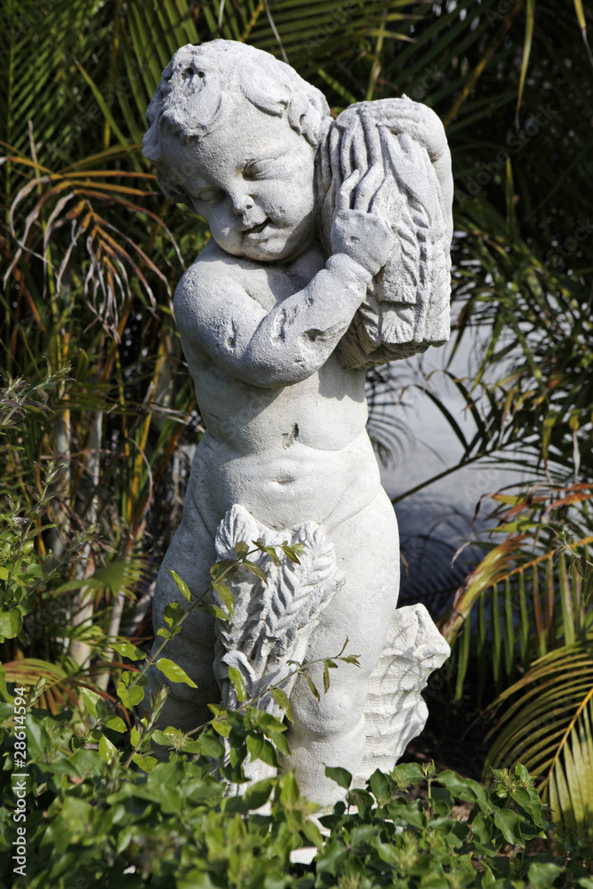 boy with jug statue