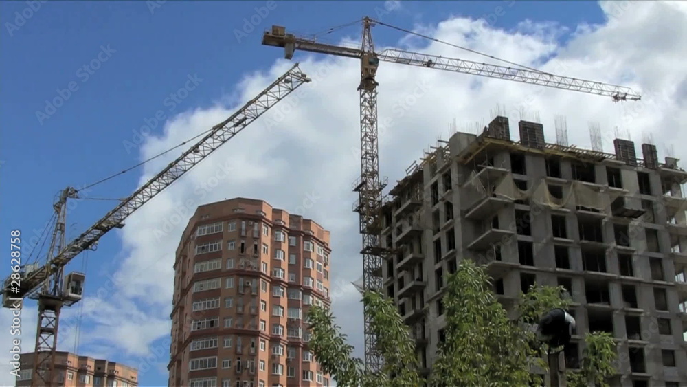 construction site and cranes - summer view construction site and cranes - summer view