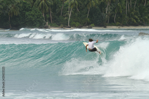 Photography Surfer on tropical wave, Indonesia