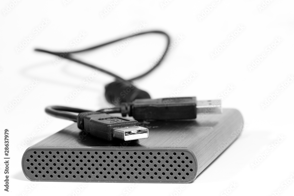 Metallic portable gigabytes harddrive isolated on white Metallic portable gigabytes harddrive isolated on white