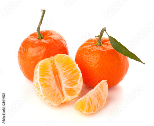 Ripe tangerines with green leaf