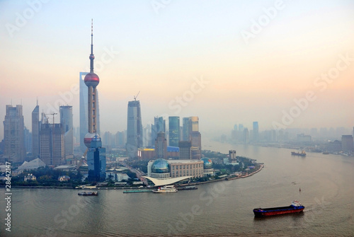 Shanghai the huangpu river and Pudong skyline at sunset.