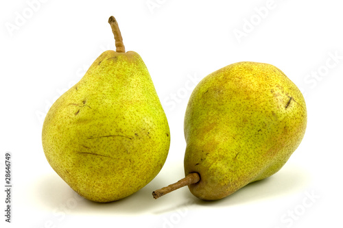 two green pears over a white background