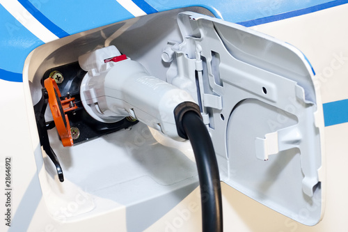 Close Up of a Hybrid Electric Car Plug for Green Environment