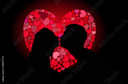 Silhouettes of lovers kissing