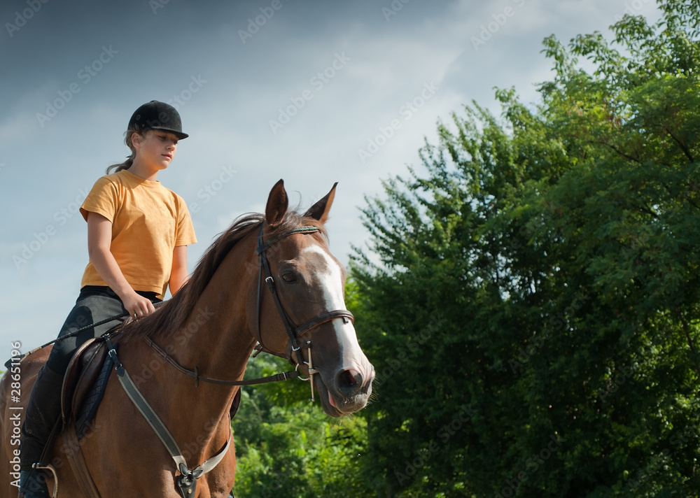Obraz premium girl riding a horse