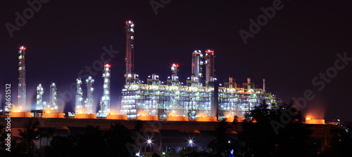 panoramic view of oil refinery factory at night © vichie81