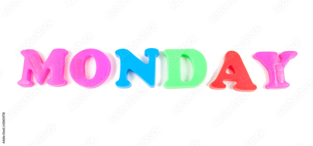 monday written in fridge magnets on white background monday written in fridge magnets on white background