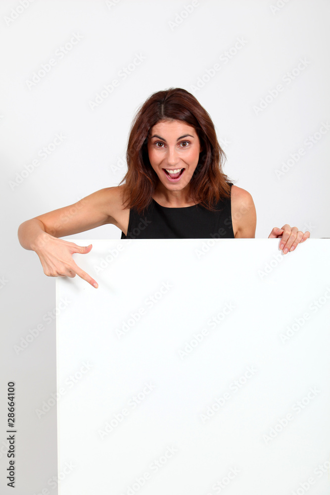 Portrait of businesswoman holding whiteboard Portrait of businesswoman holding whiteboard