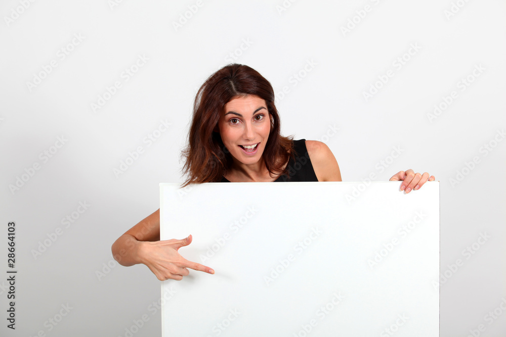 Portrait of businesswoman holding whiteboard Portrait of businesswoman holding whiteboard