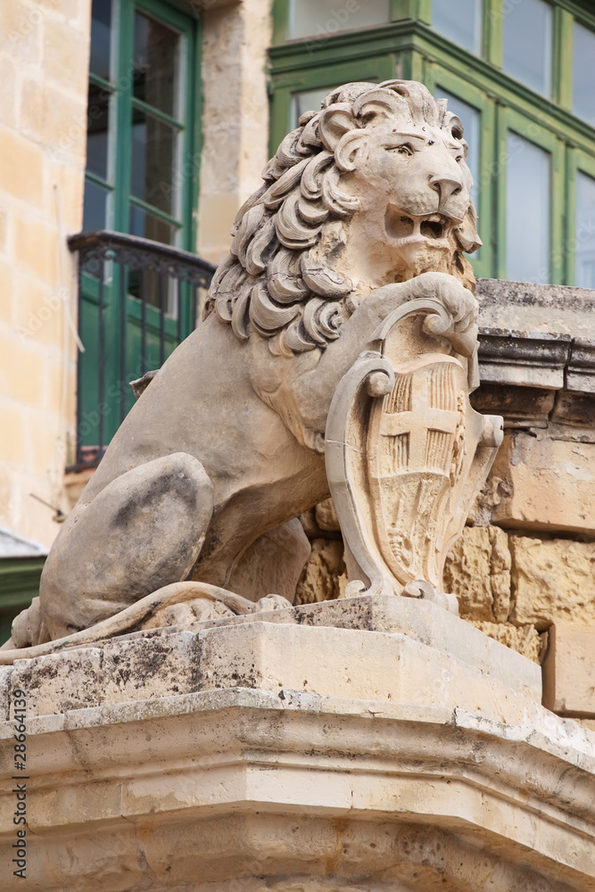 Sculpture of lion with  Valletta emblem