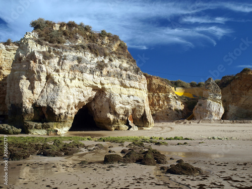 Algarve coast at low tide the ocean . photo