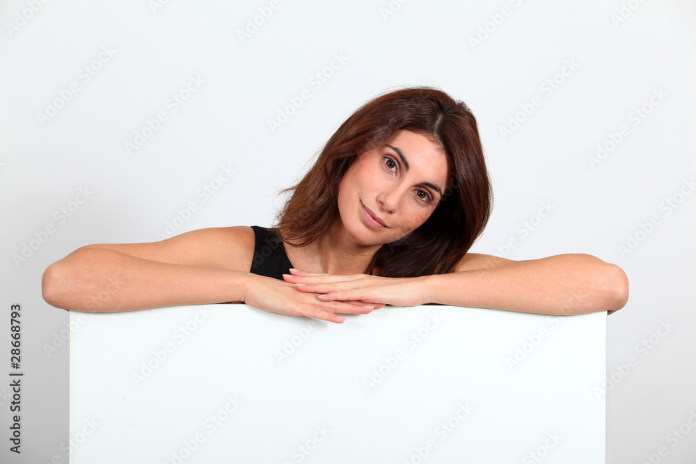 Portrait of businesswoman holding whiteboard Portrait of businesswoman holding whiteboard