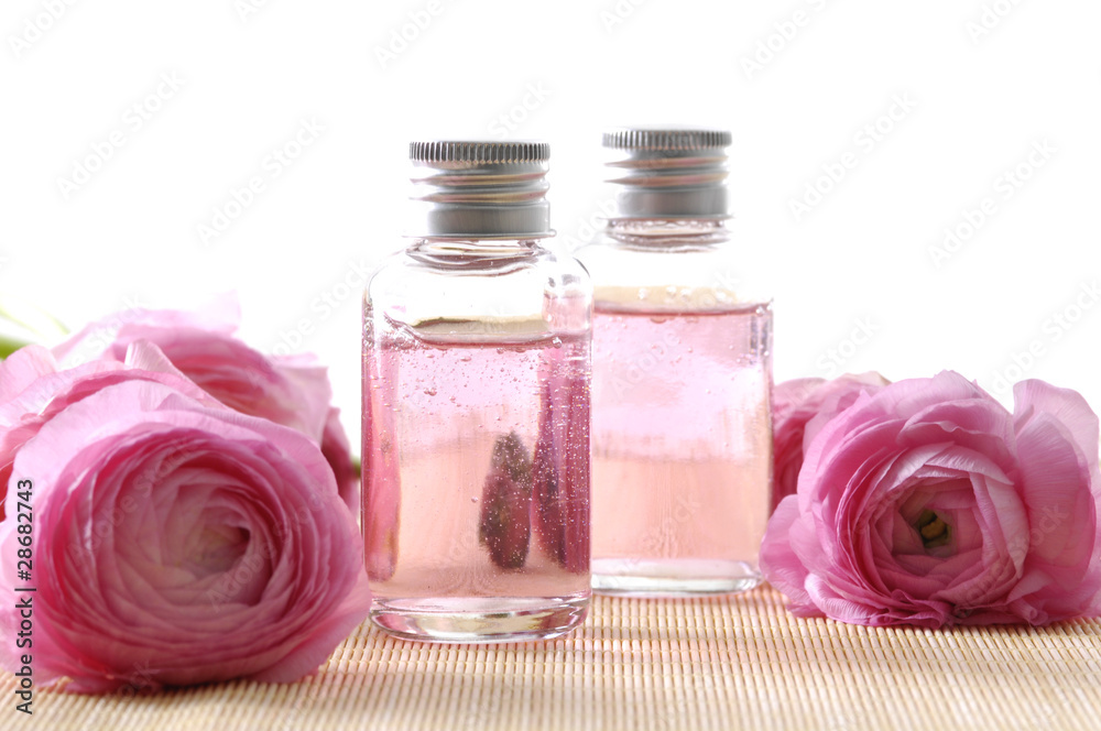 bottles of aromatic oil with pink hydrangea bottles of aromatic oil with pink hydrangea