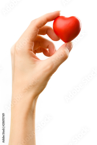 Female hand with red heart