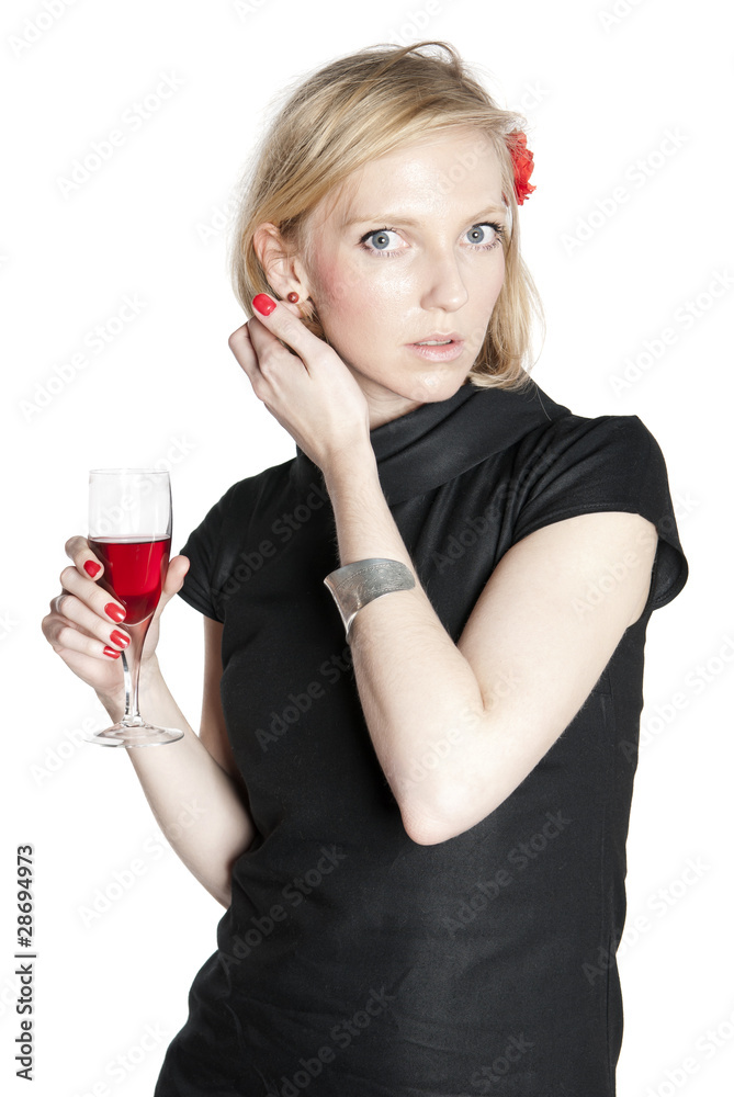 Young attractive woman holding a glass of red wine Young attractive woman holding a glass of red wine