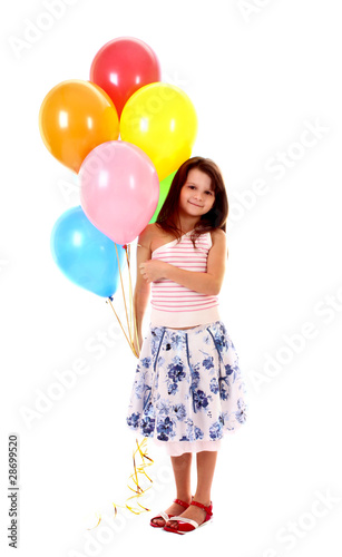 little girl holding a bunch of happy flying balls on white backg © Africa Studio