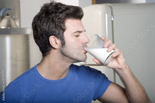 man drinking milk
