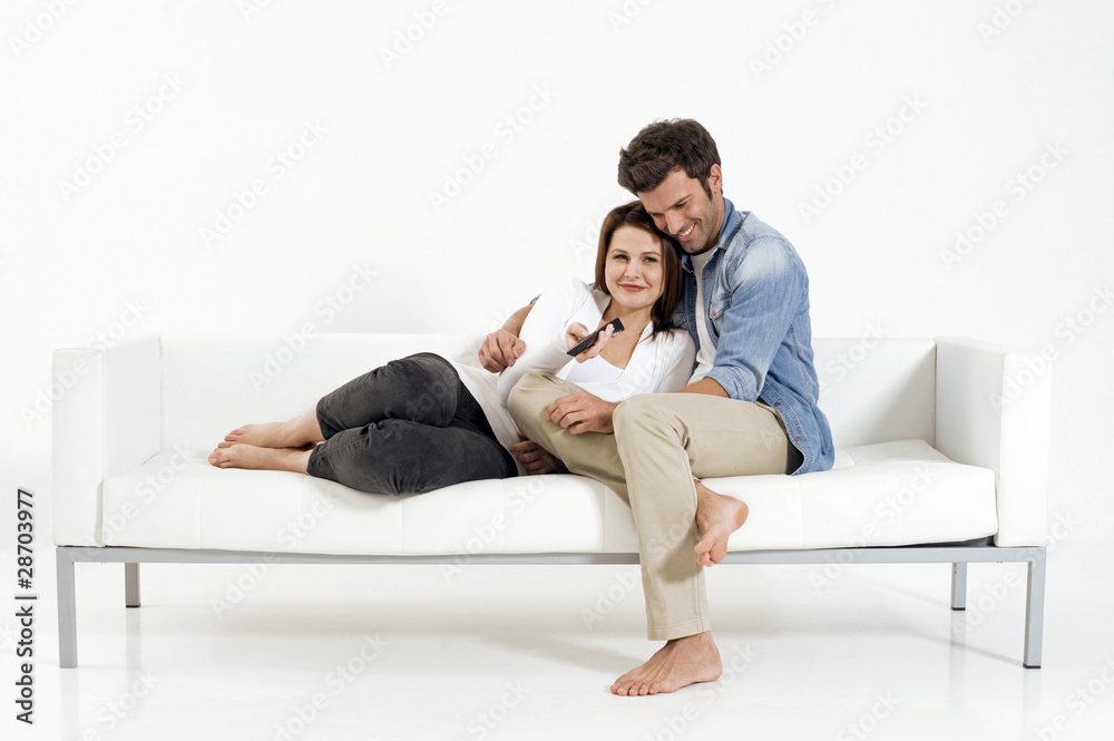 Couple on the couch watching TV