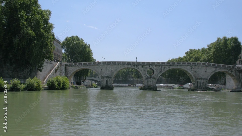 ride on Tiber River under many archways in Rome ride on Tiber River under many archways in Rome