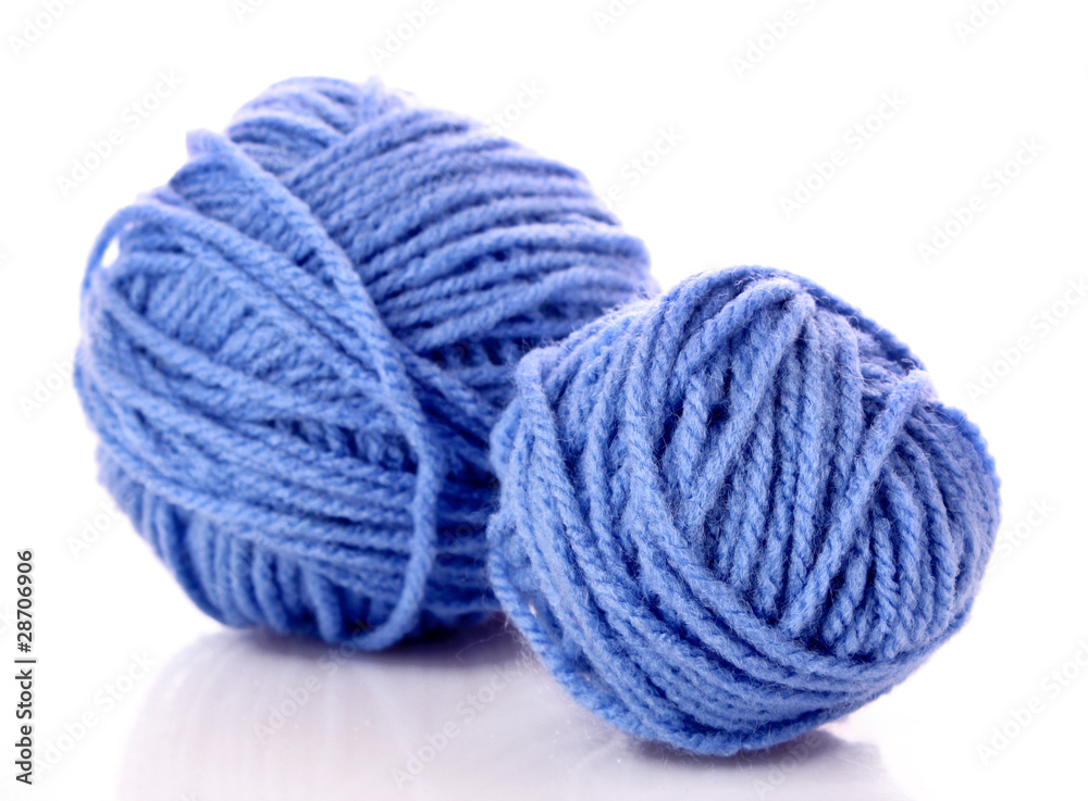 Blue balls of woollen thread isolated on white Blue balls of woollen thread isolated on white
