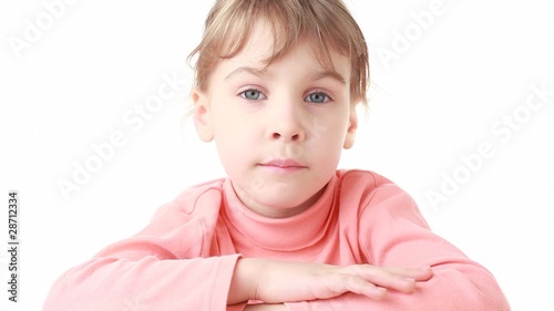 little girl looks at camera initially sadness, then happy