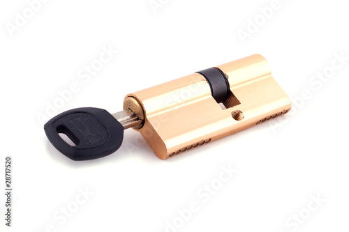 Closed blue locksmith with key isolated on white background.