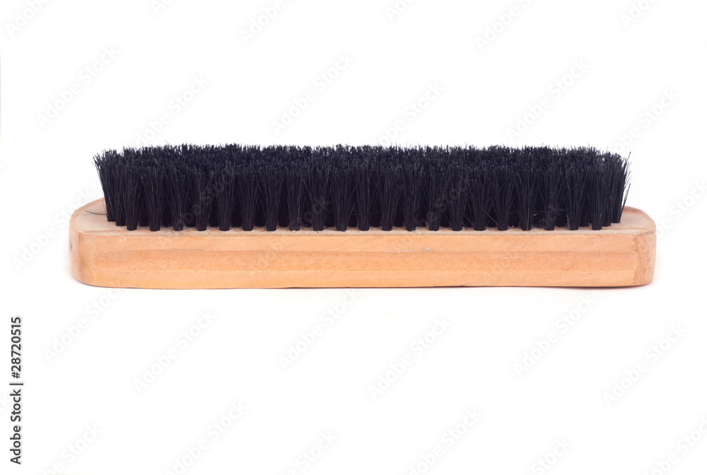 Brown wooden brush isolated on white background. Brown wooden brush isolated on white background.
