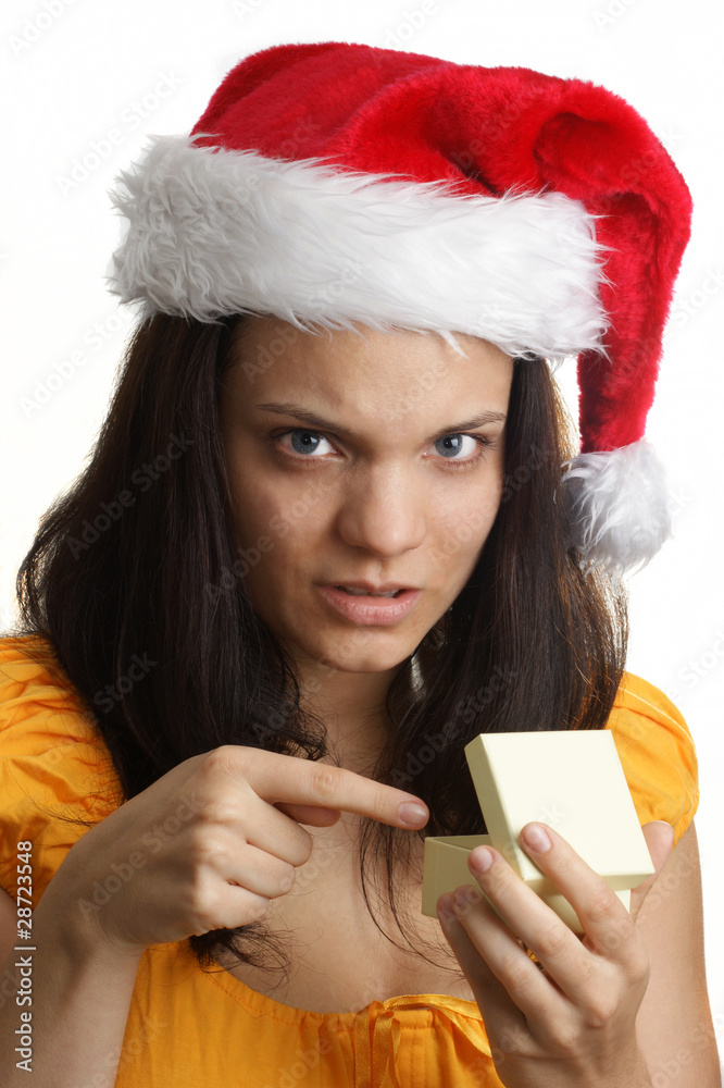 eine junge Frau trägt eine Weihnachtsmütze eine junge Frau trägt eine Weihnachtsmütze