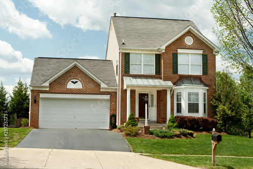 Front View Brick Single Family House Home Suburban Maryland, USA © qingwa