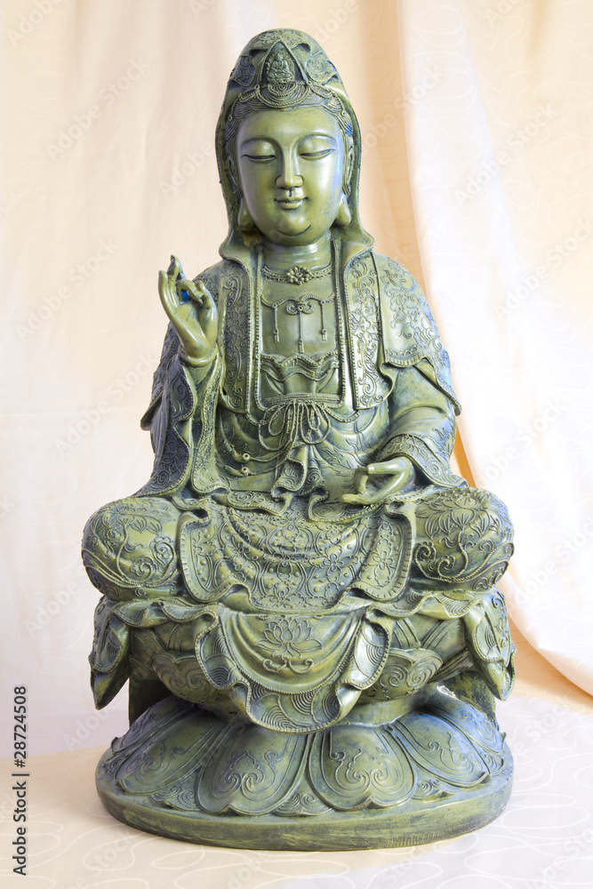 Bronze figure of sitting and meditating Buddha