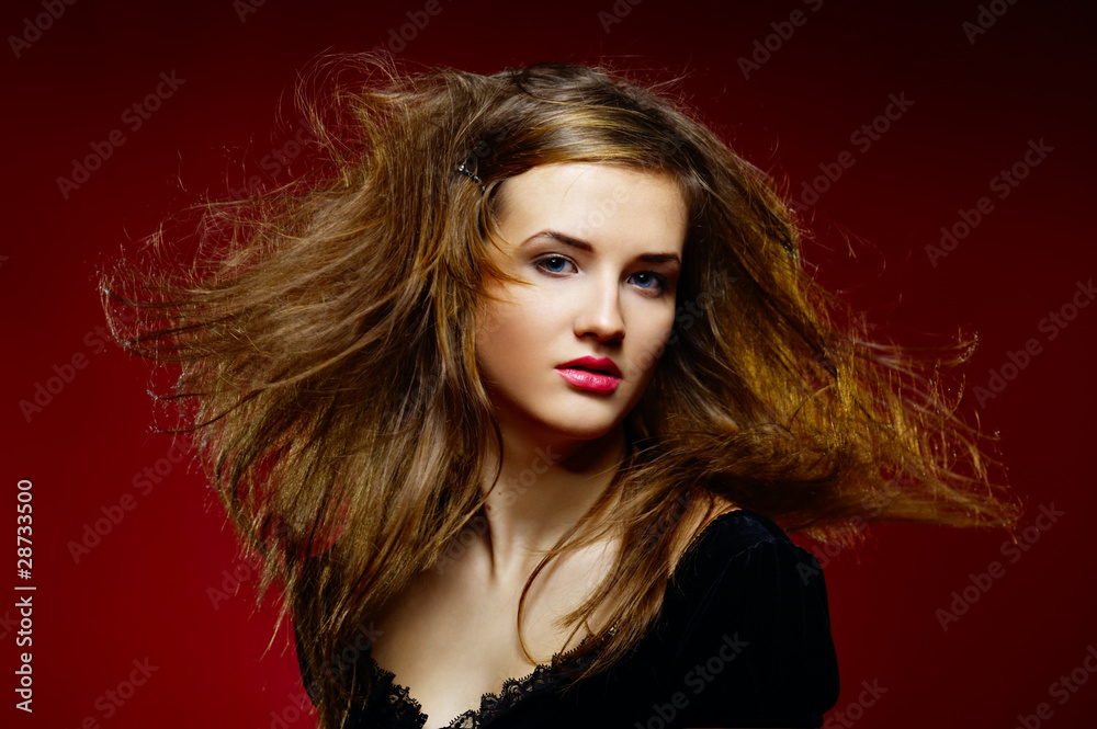 Portrait of the beautiful girl a wild hair Portrait of the beautiful girl a wild hair